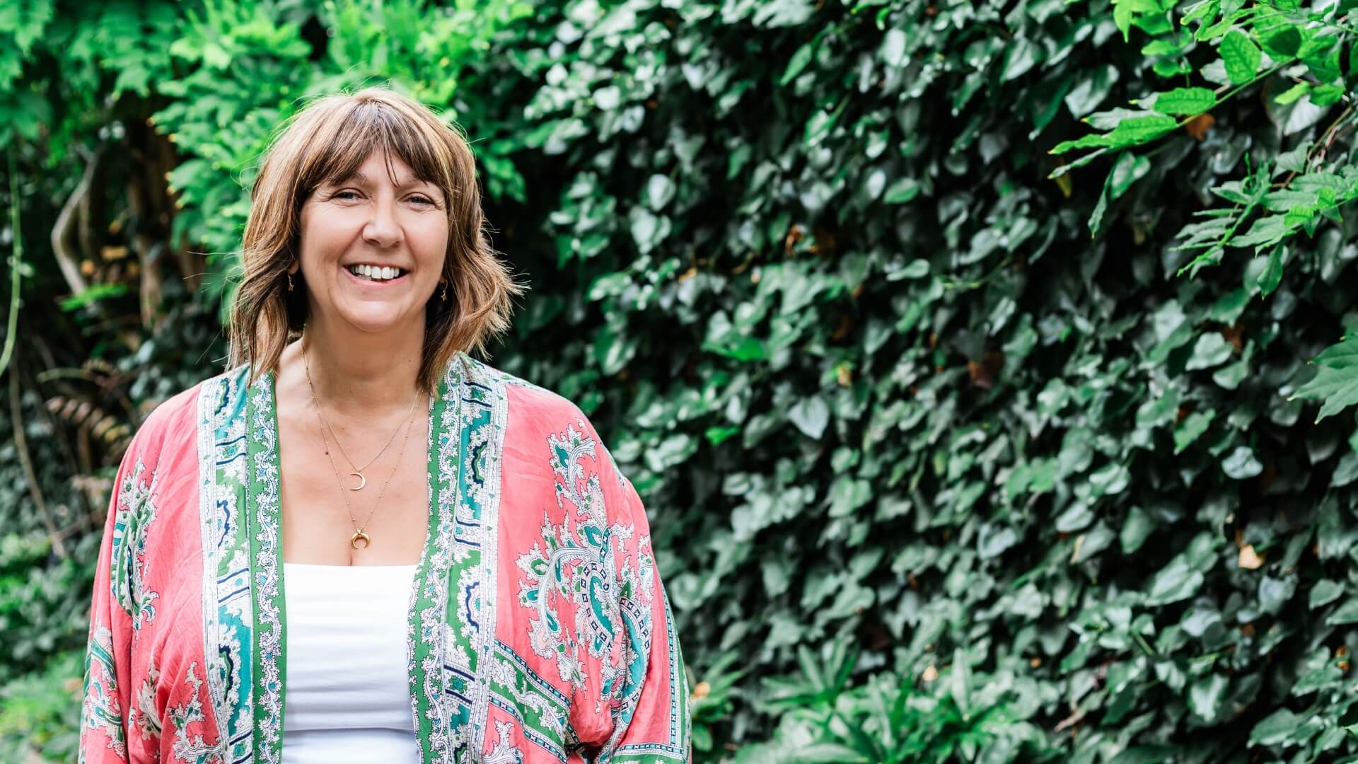 Photo of Lou May from the Bigger Picture Therapy, a Holistic Counsellor and Coach smiling to the camera. Photo taken by Amanda Hutchinson